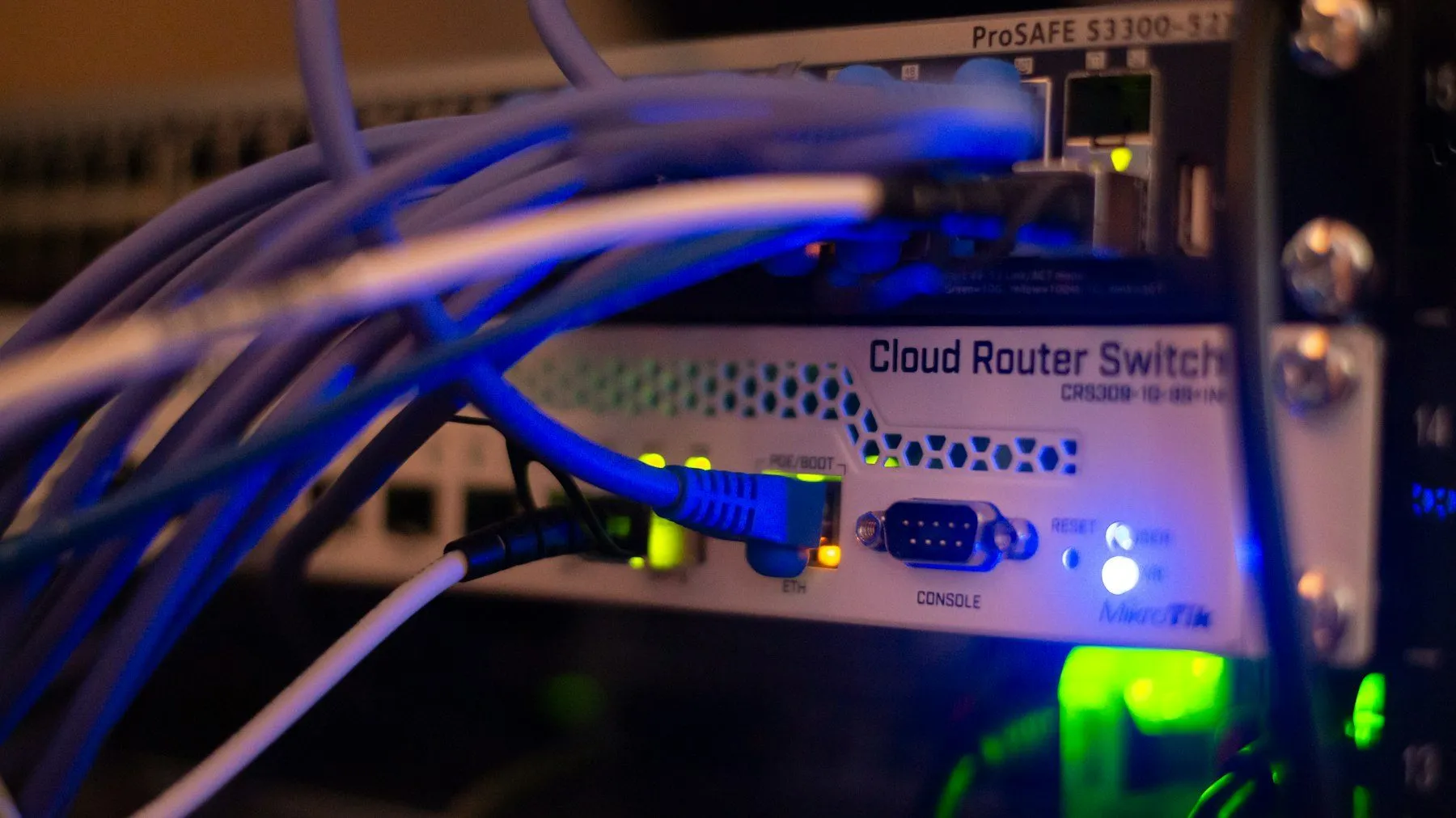 A network switch with Ethernet cables connected.