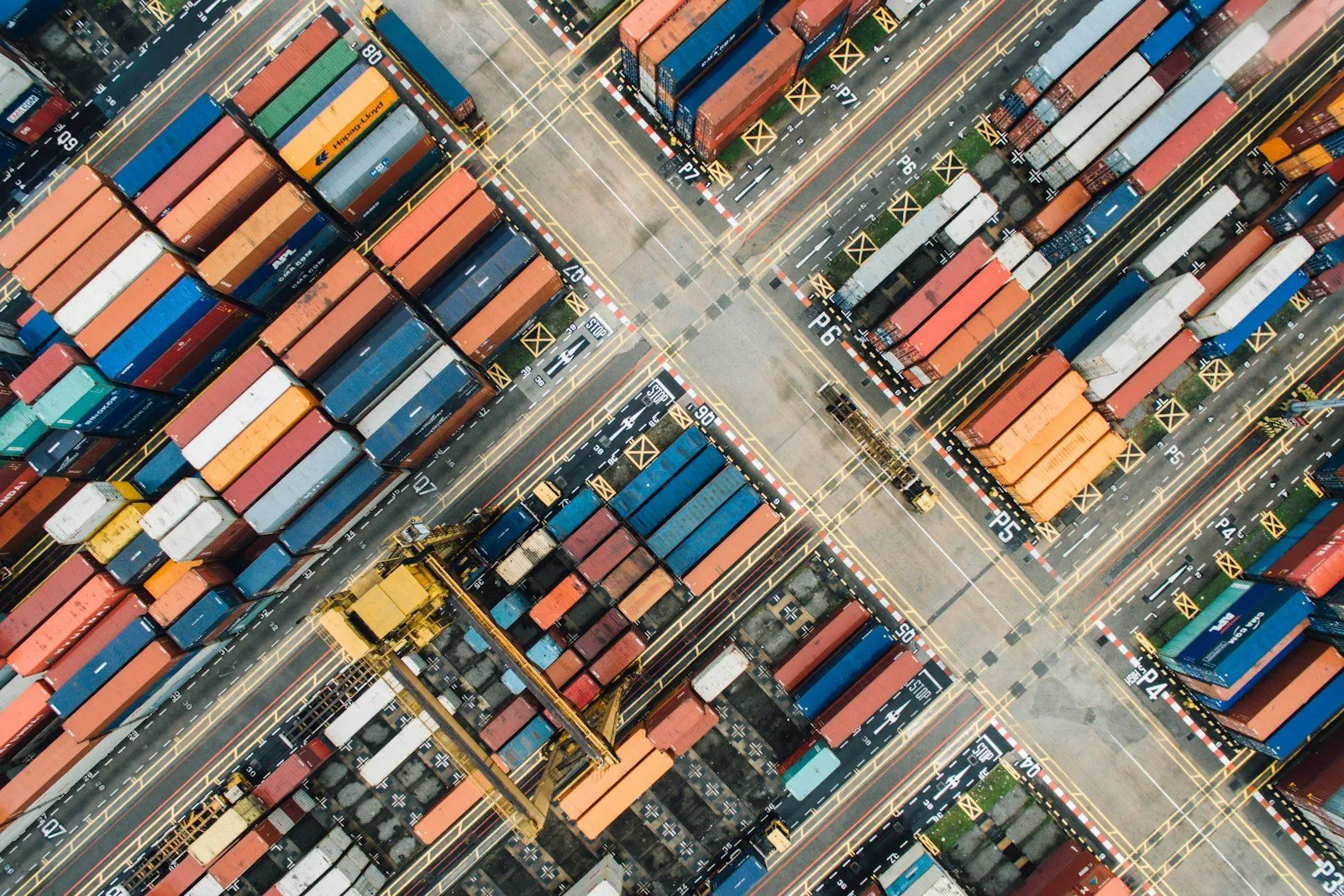 Shipping containers stacked in a yard — duty applies at the port of entry.